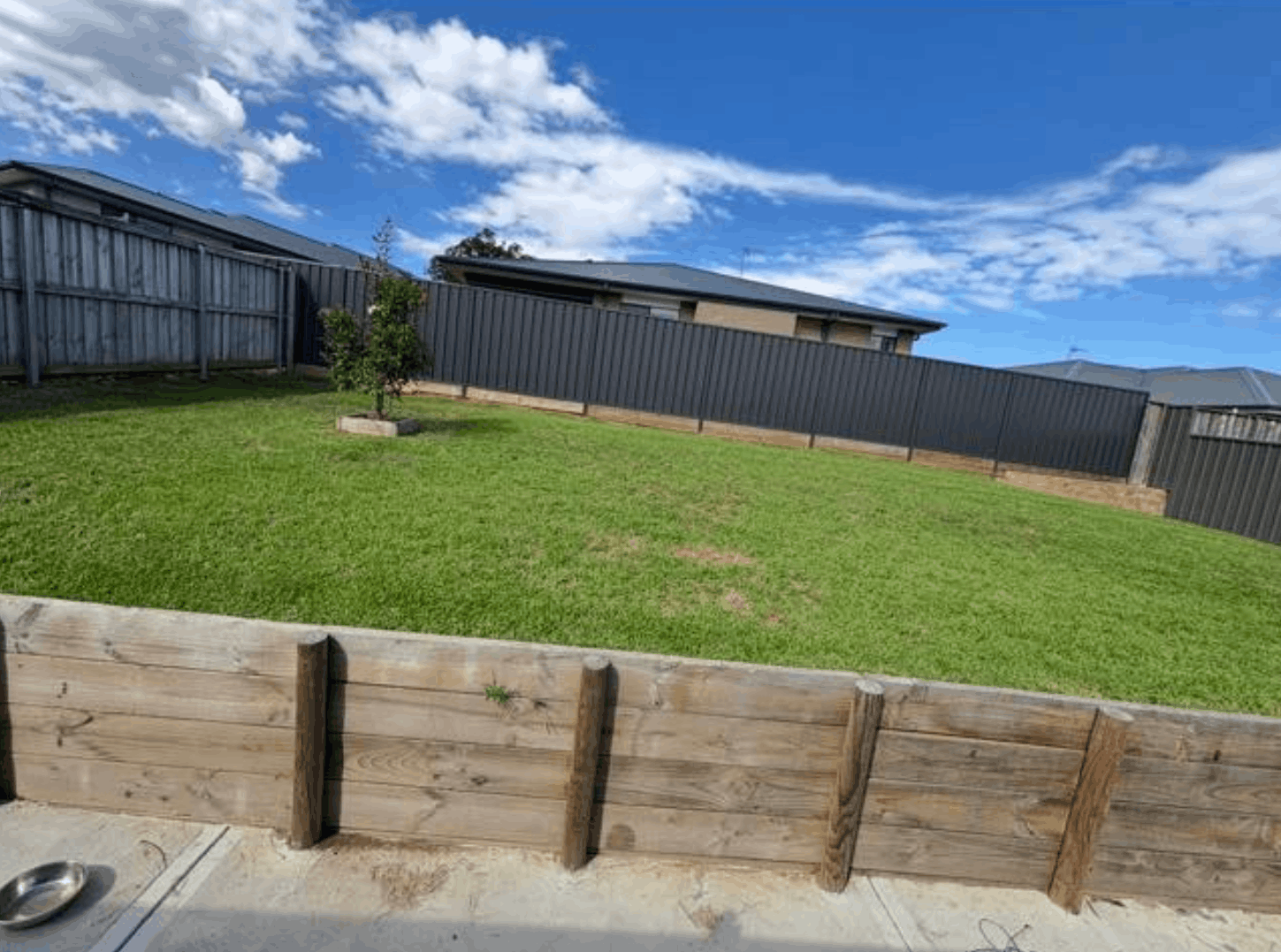 Lush green mown lawn beside a Hunter Valley home